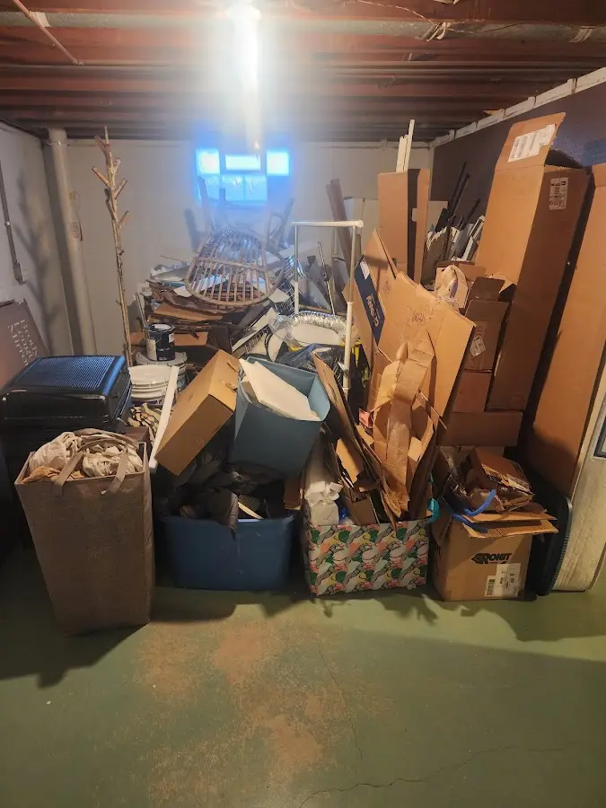 Roll-off dumpster container at job site for 4 Yard Dumpster Rental in South Weber